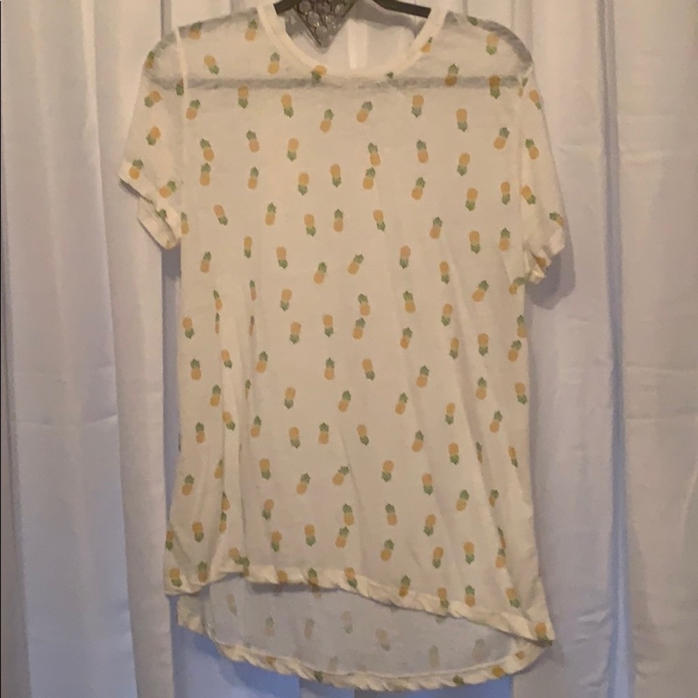 White shirt with small pineapples